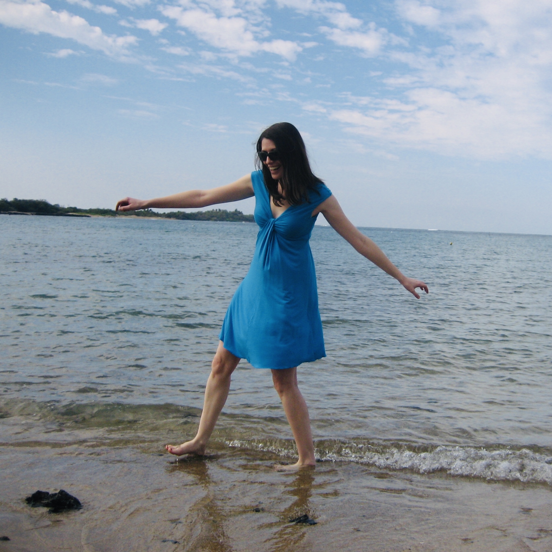 Amanda dancing on the beach